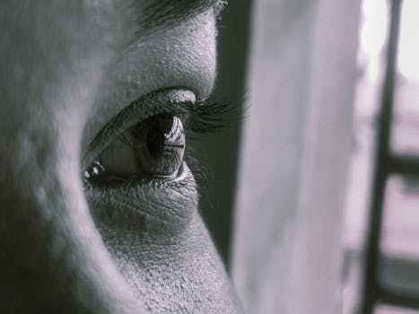 SMILE & ICL Vision Correction Detailed close-up of a human eye showcasing eyelashes and skin texture.